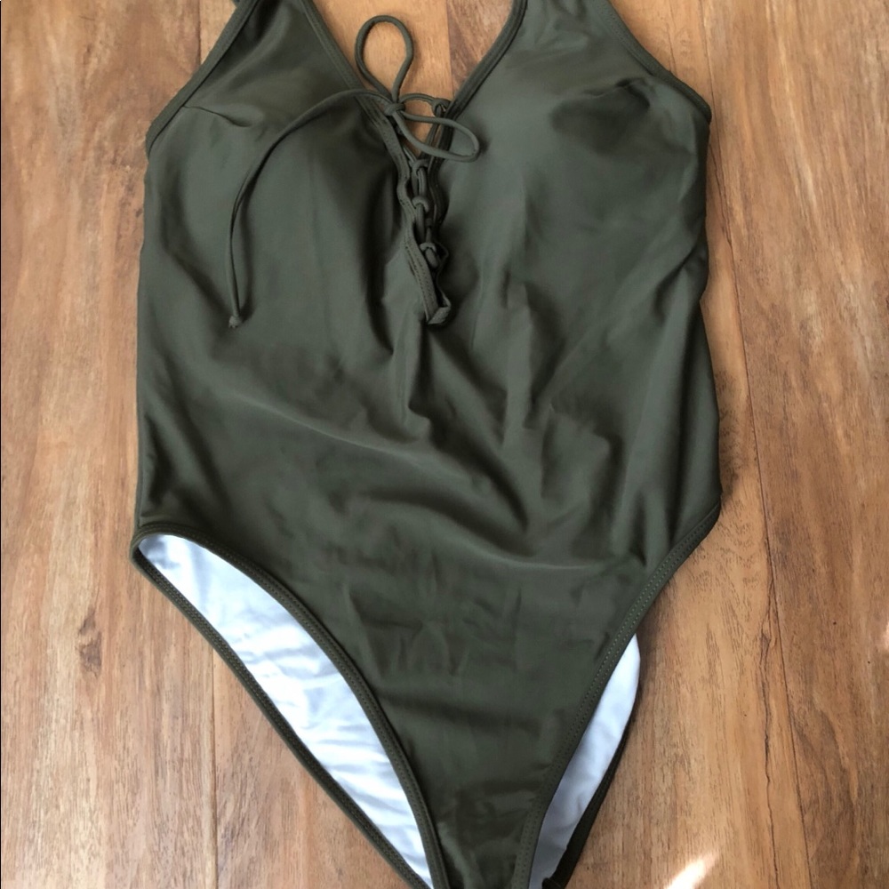 Olive one piece swimsuit .